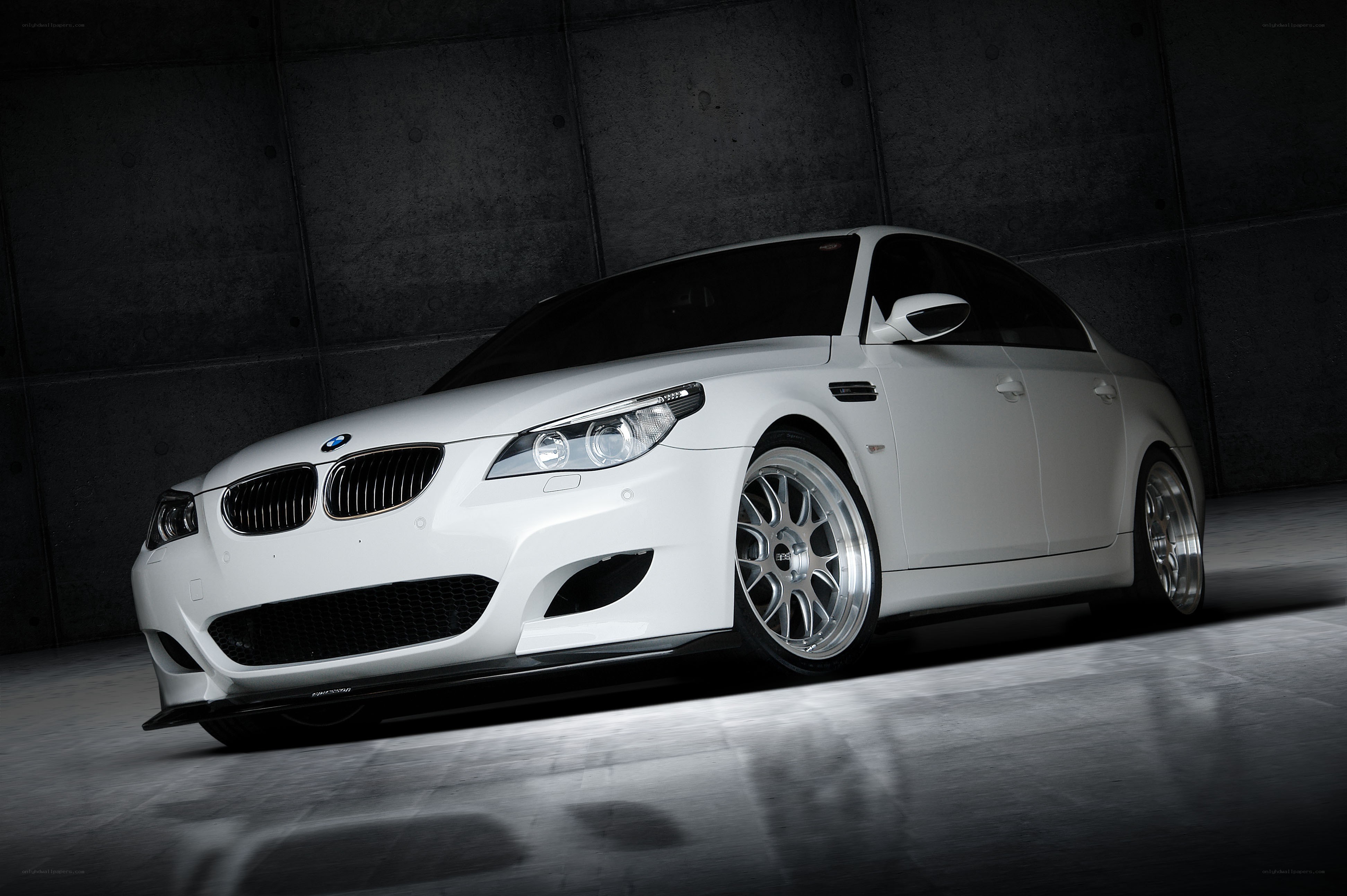 white bmw m5 sedan
