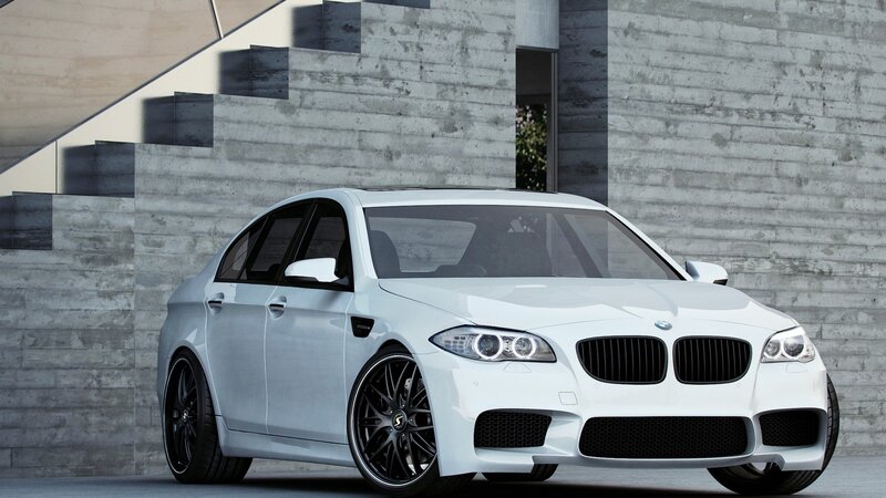 white bmw m5 sedan