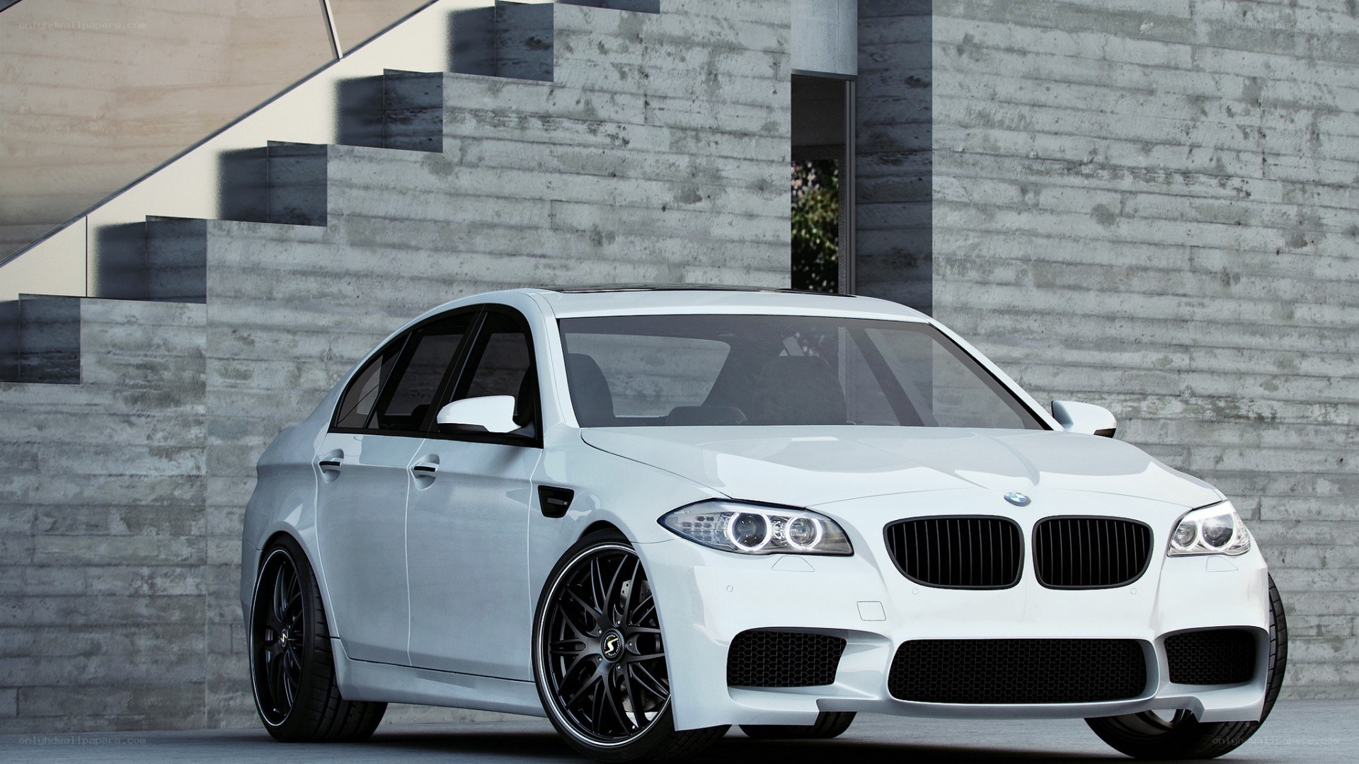 white bmw m5 sedan