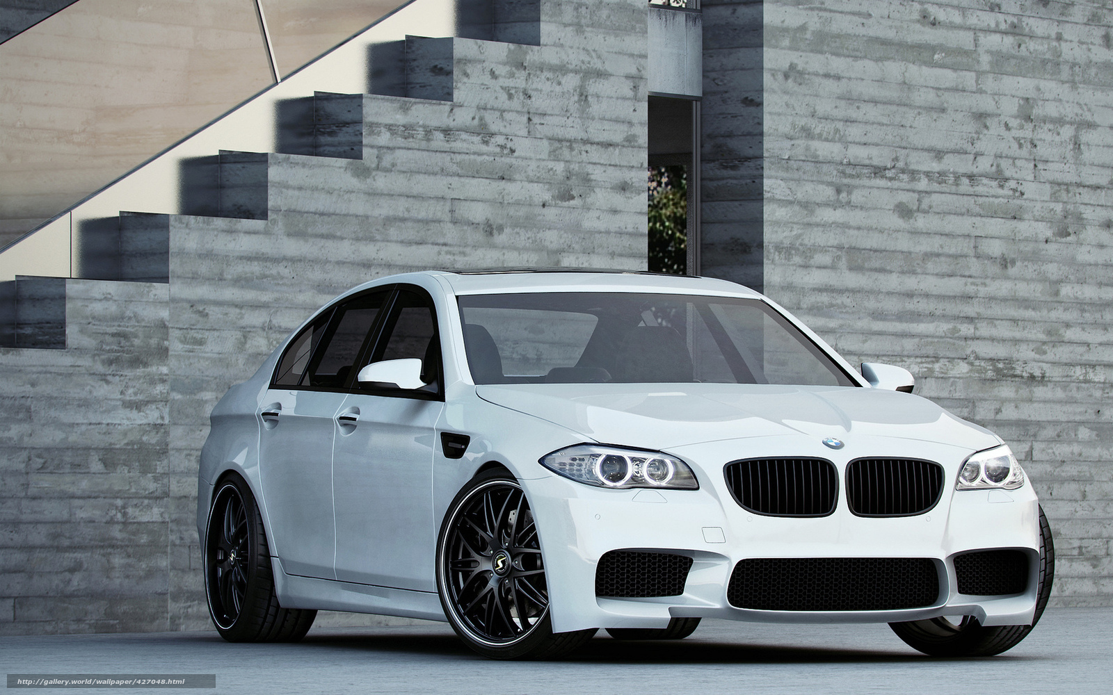 white bmw m5 sedan