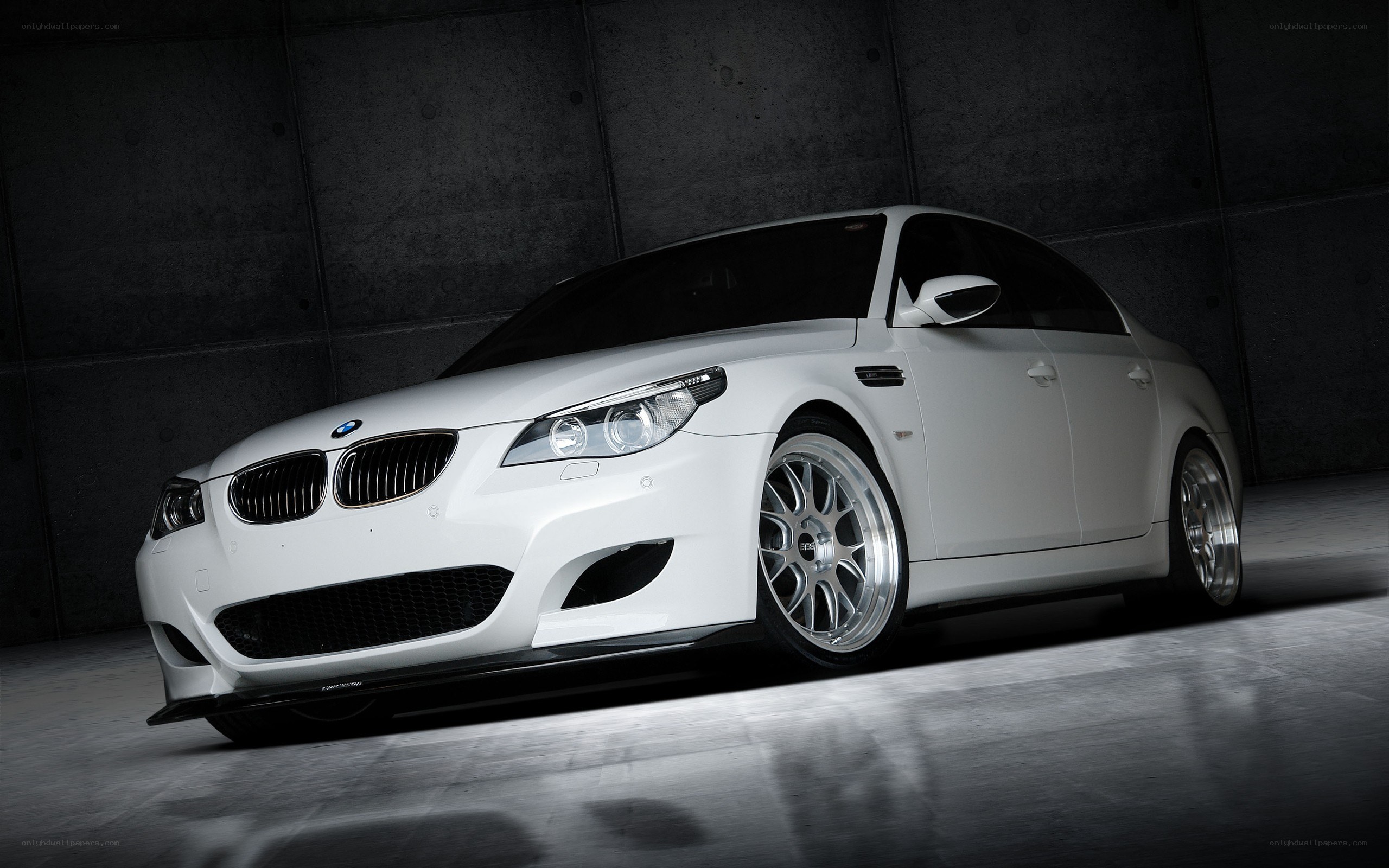 white bmw m5 sedan