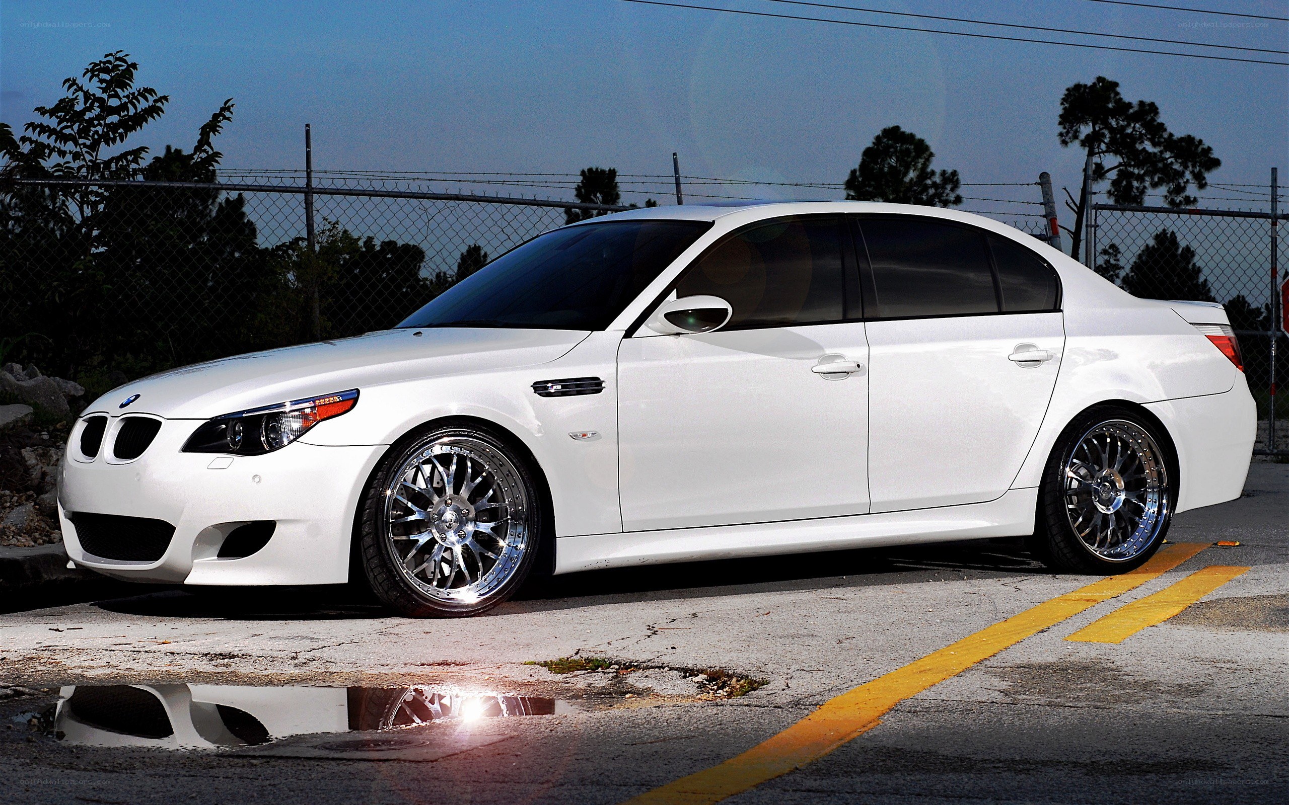white bmw m5 sedan