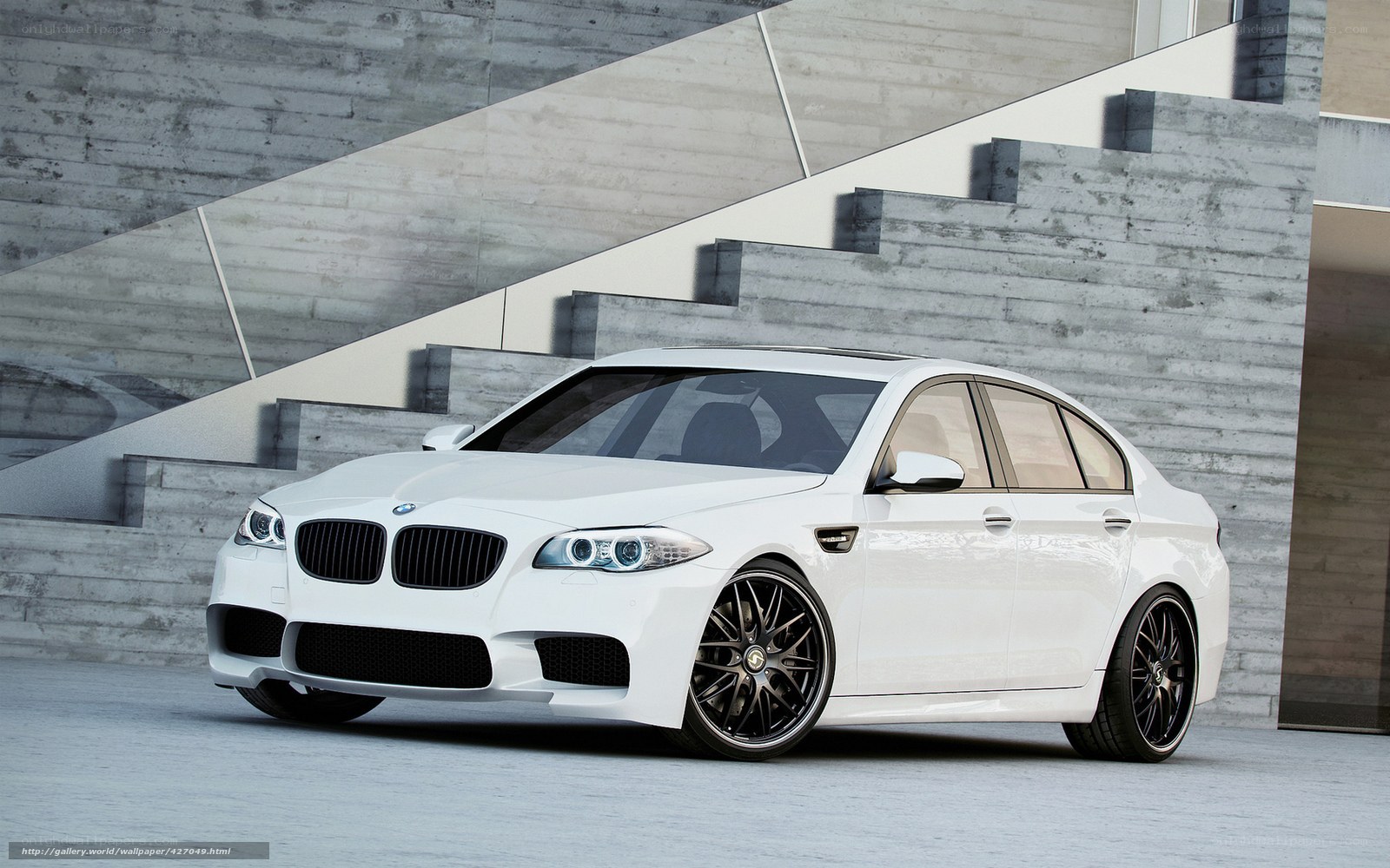 White BMW M5 sedan