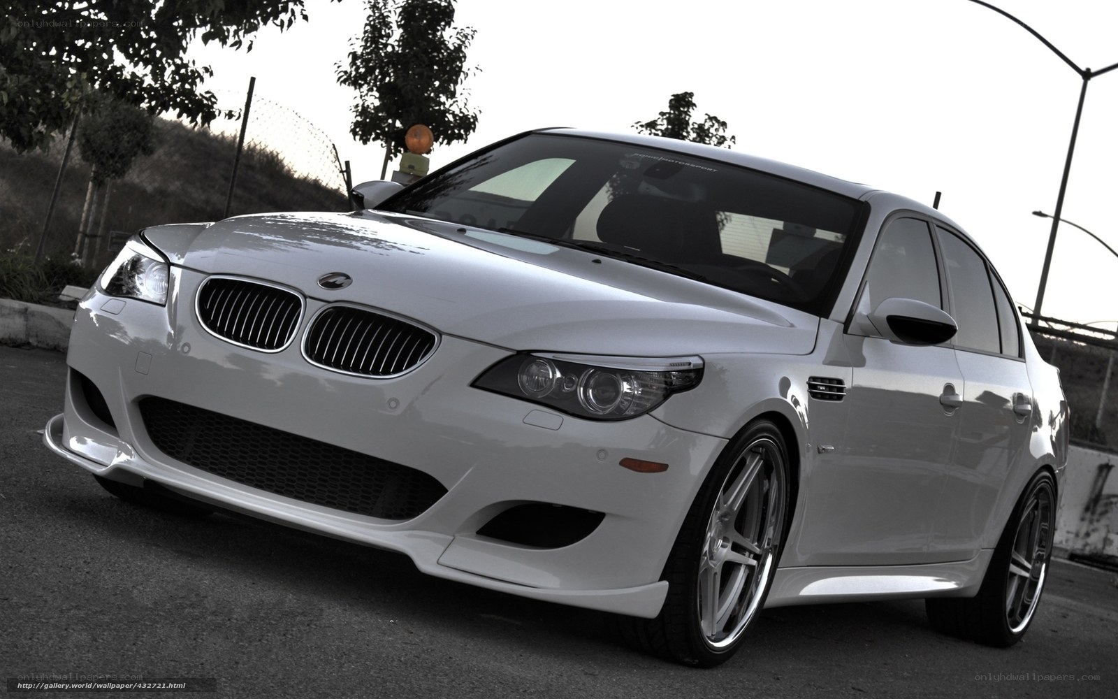 white bmw m5 sedan