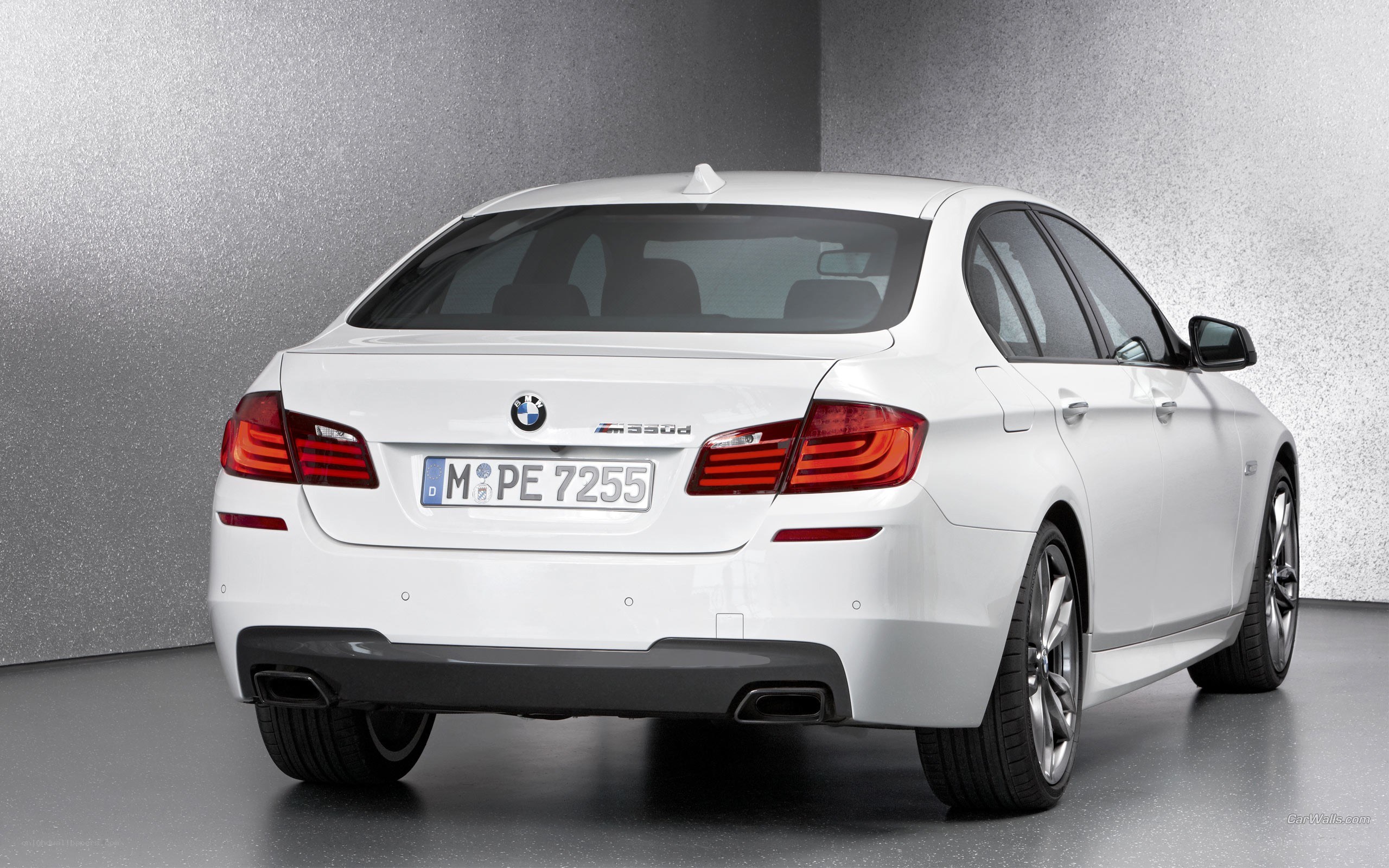 white bmw m530d sedan