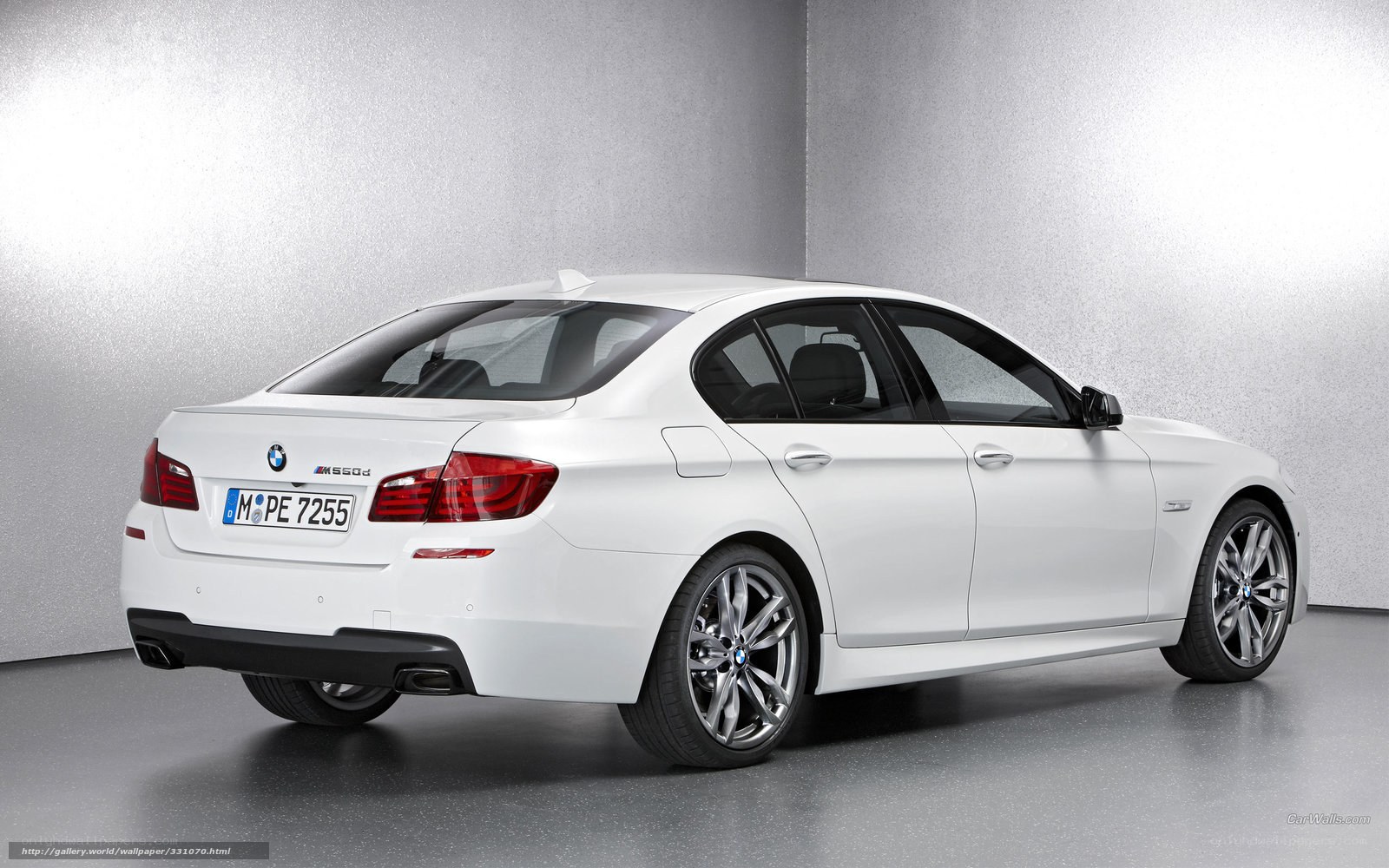 white bmw m550d sedan