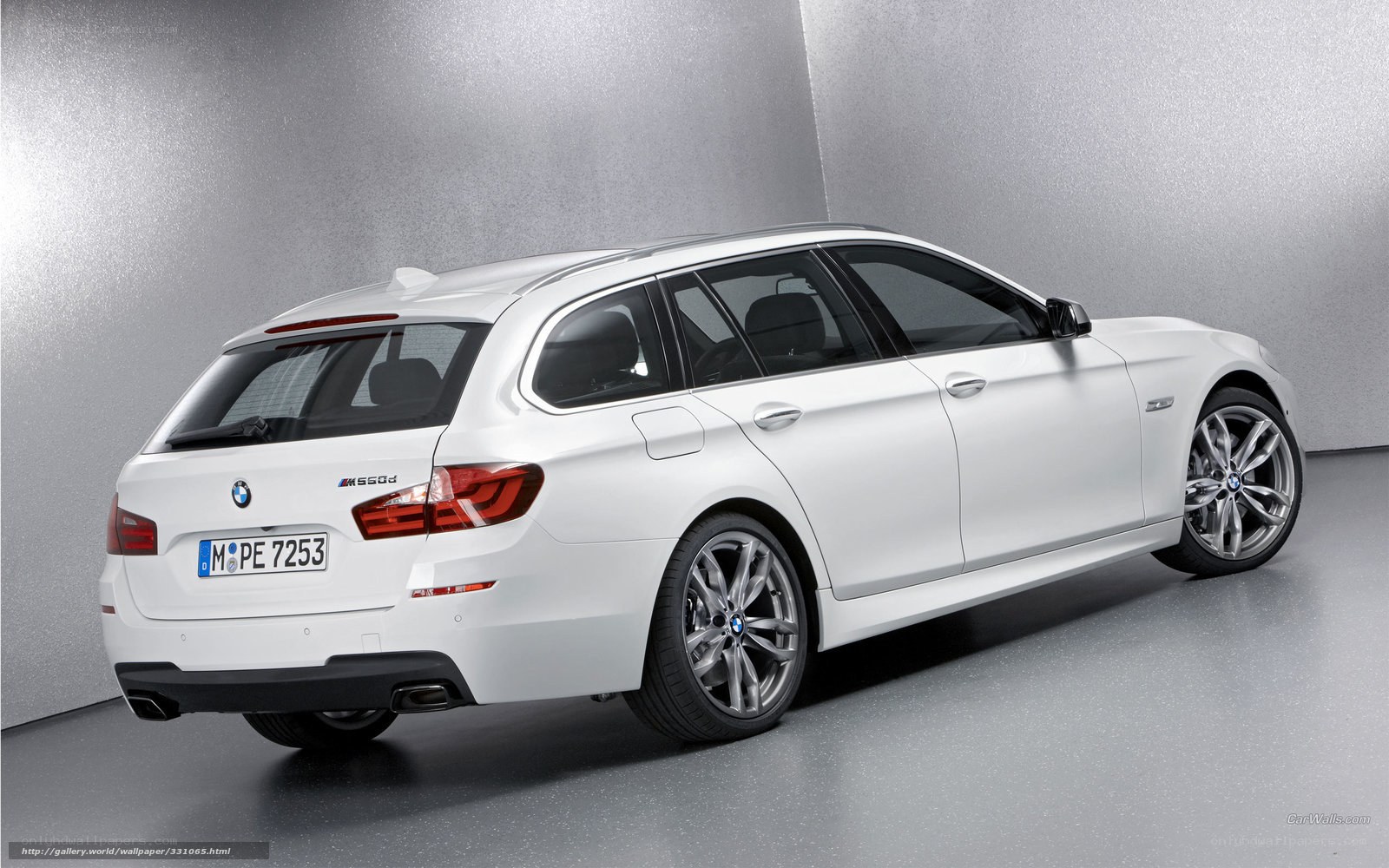 white bmw m550d station wagon