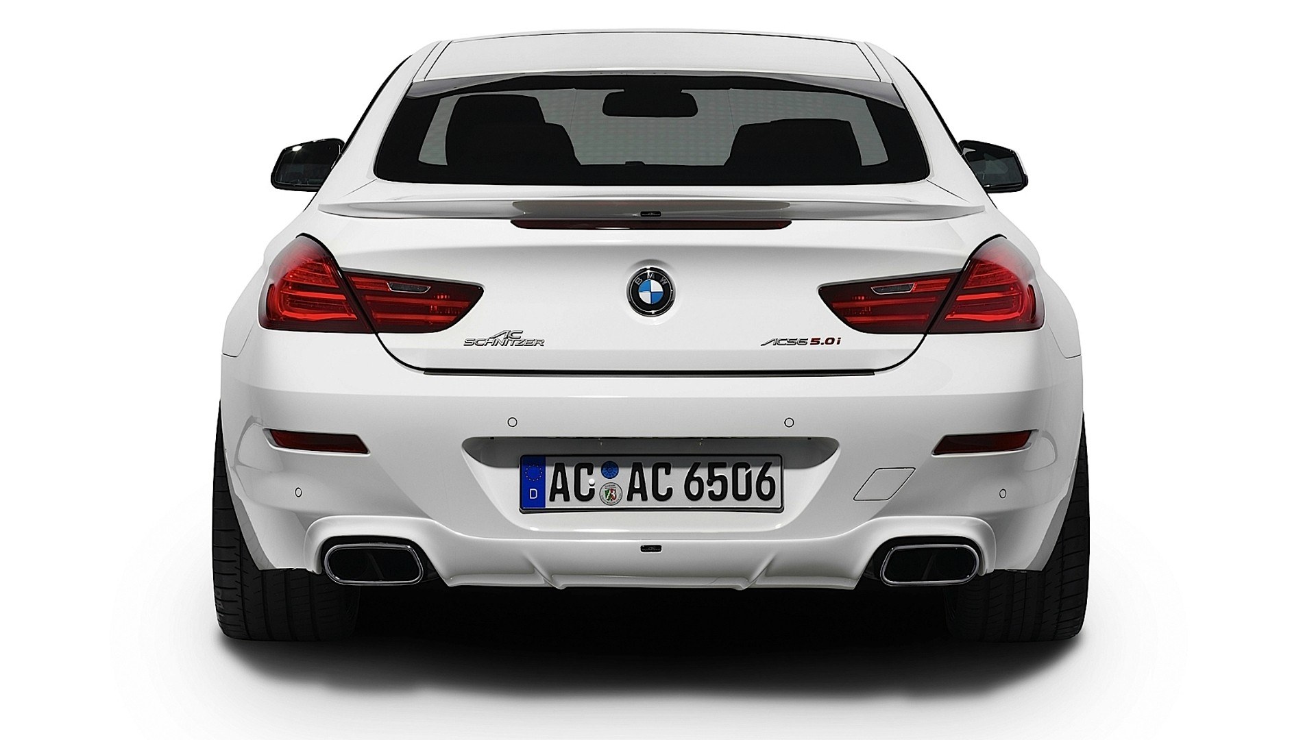 white bmw m6 coupe rear view