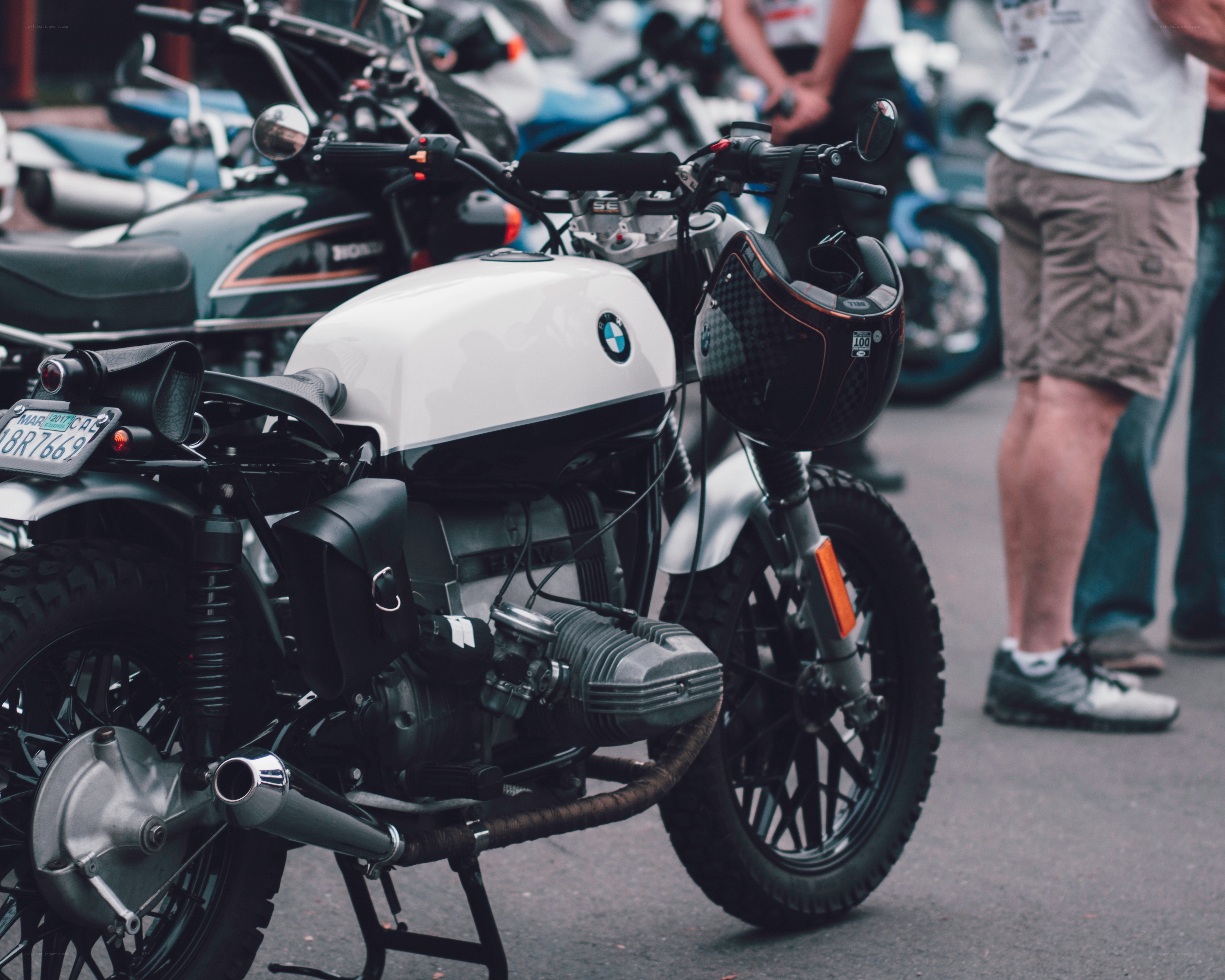 White BMW motorcycle at a show