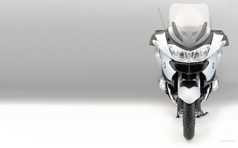 white BMW motorcycle front view