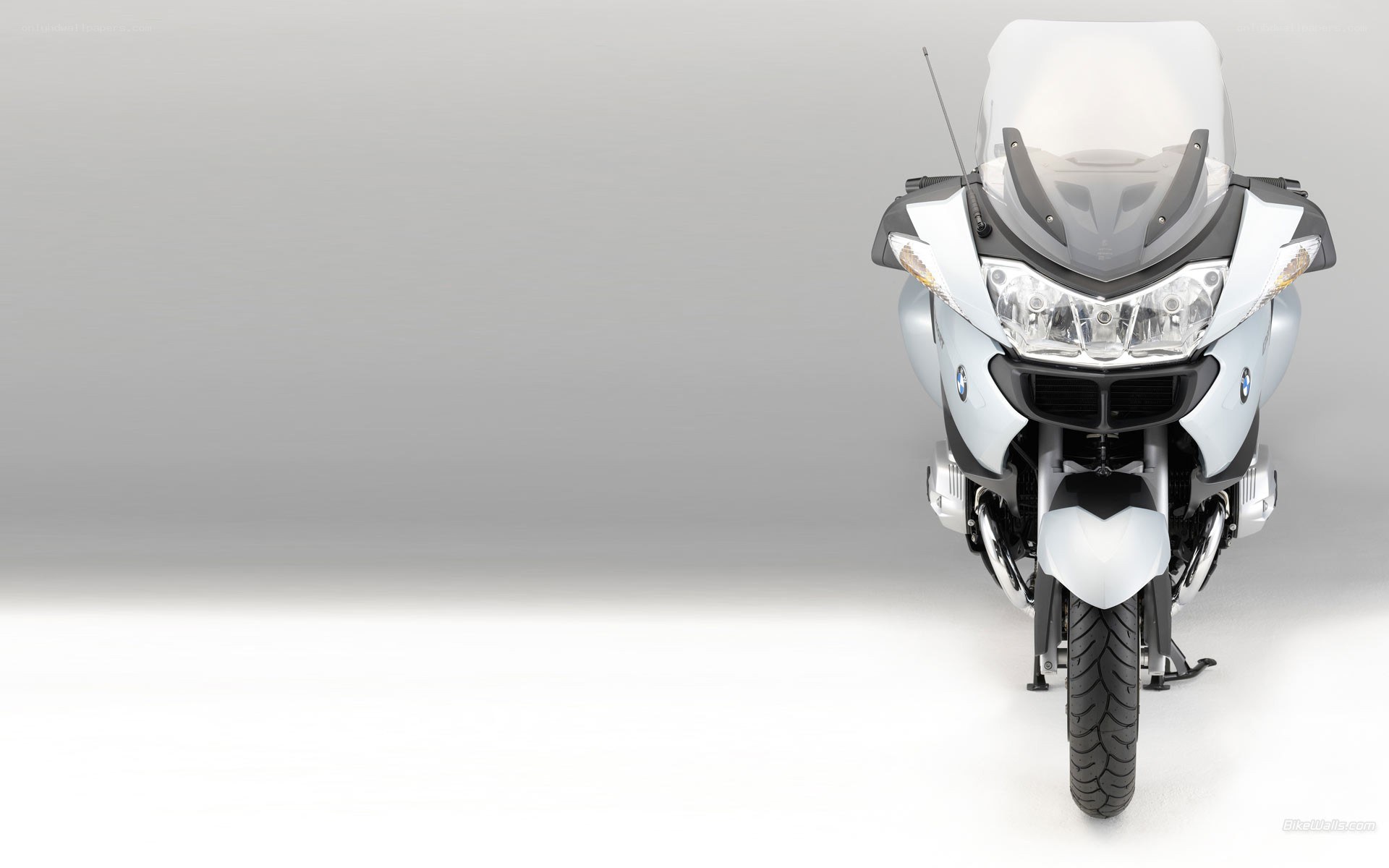 white BMW motorcycle front view