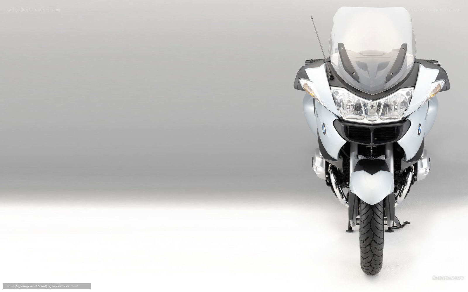 white BMW motorcycle front view