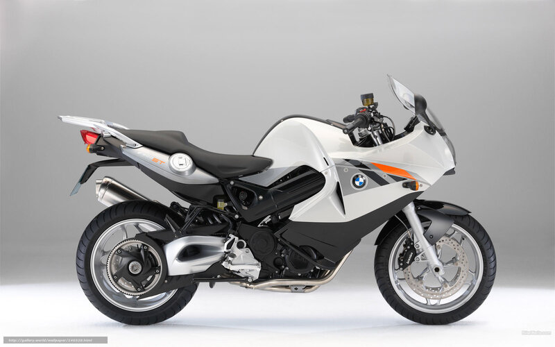 white bmw motorcycle side view