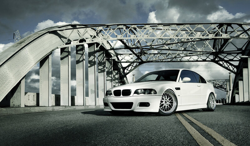 white bmw on a bridge