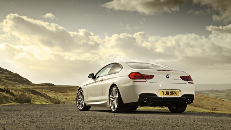 White BMW on a country road