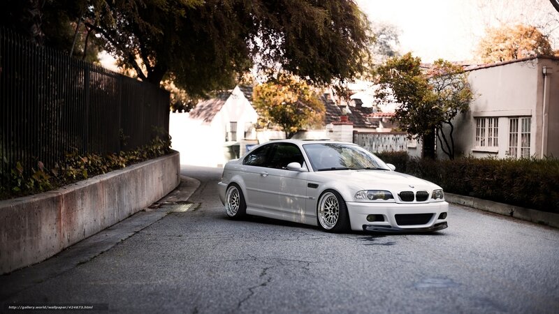 white bmw on a quiet street