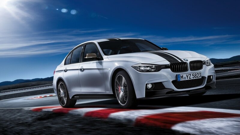White BMW on a racetrack