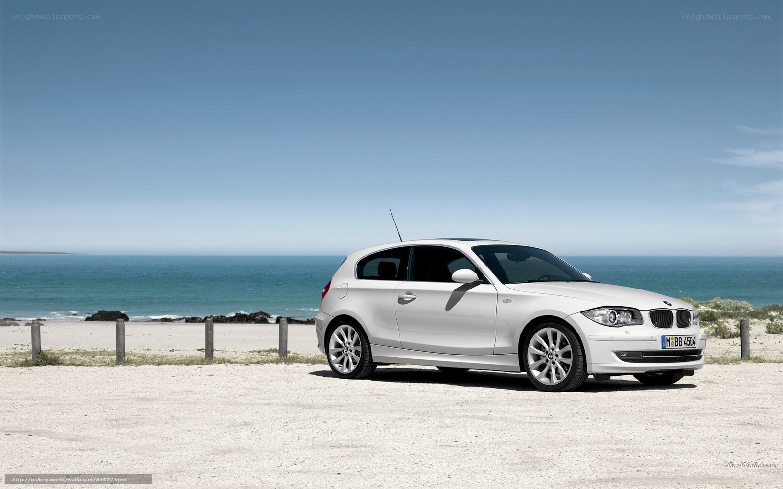 White BMW on beach
