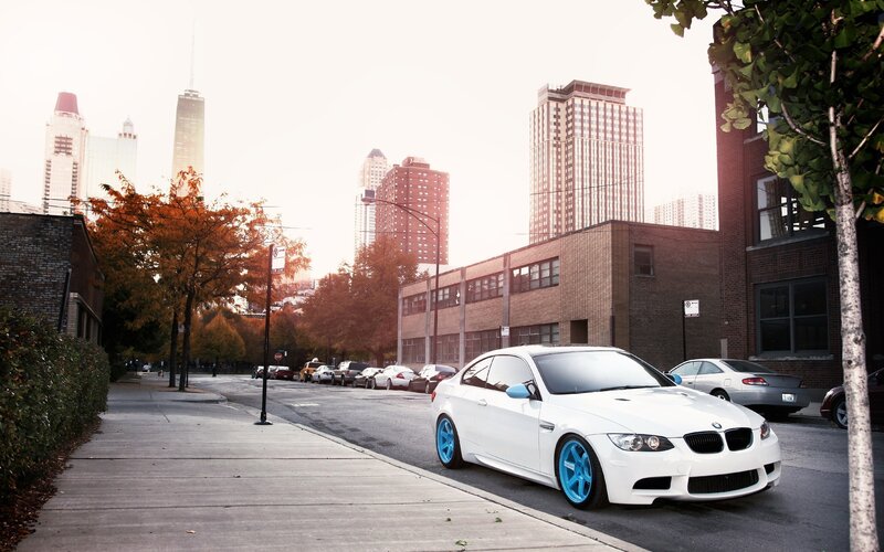 White BMW on city street
