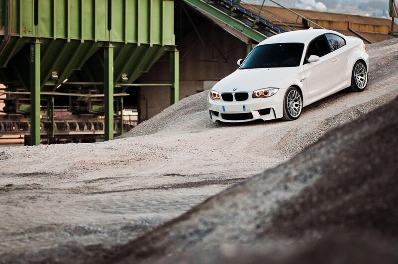 White BMW on gravel slope