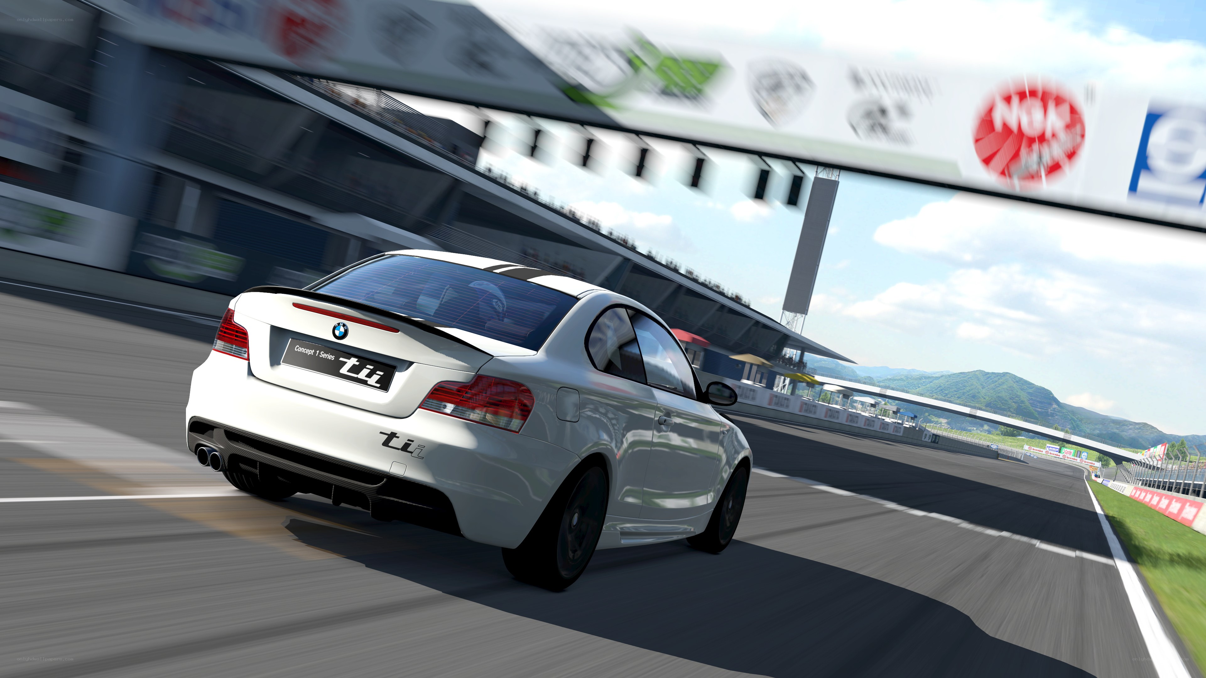 white bmw on racetrack