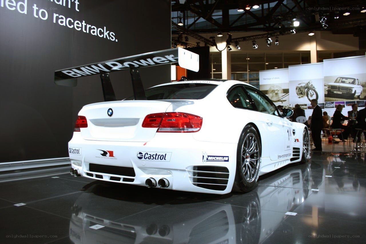 white bmw race car on display
