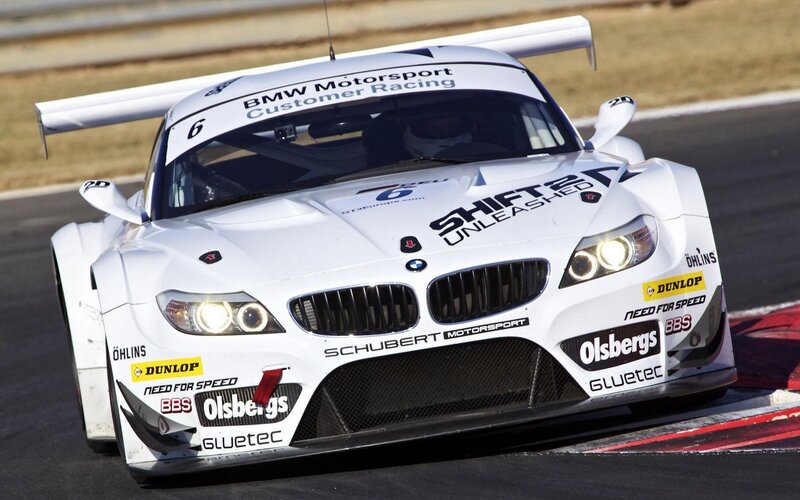 white bmw race car on track