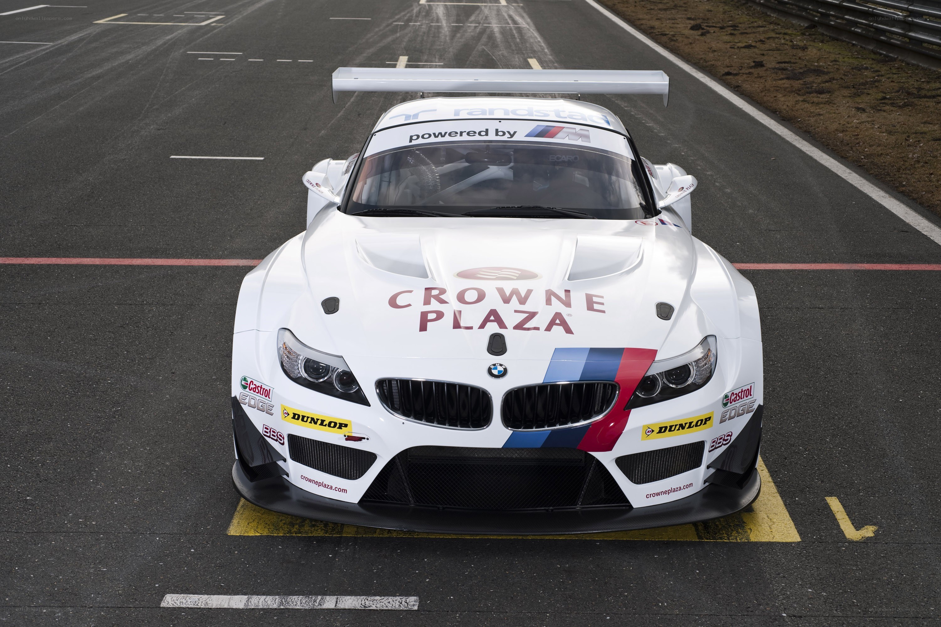 white bmw race car on track