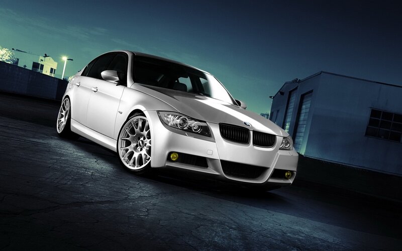 white bmw sedan at night