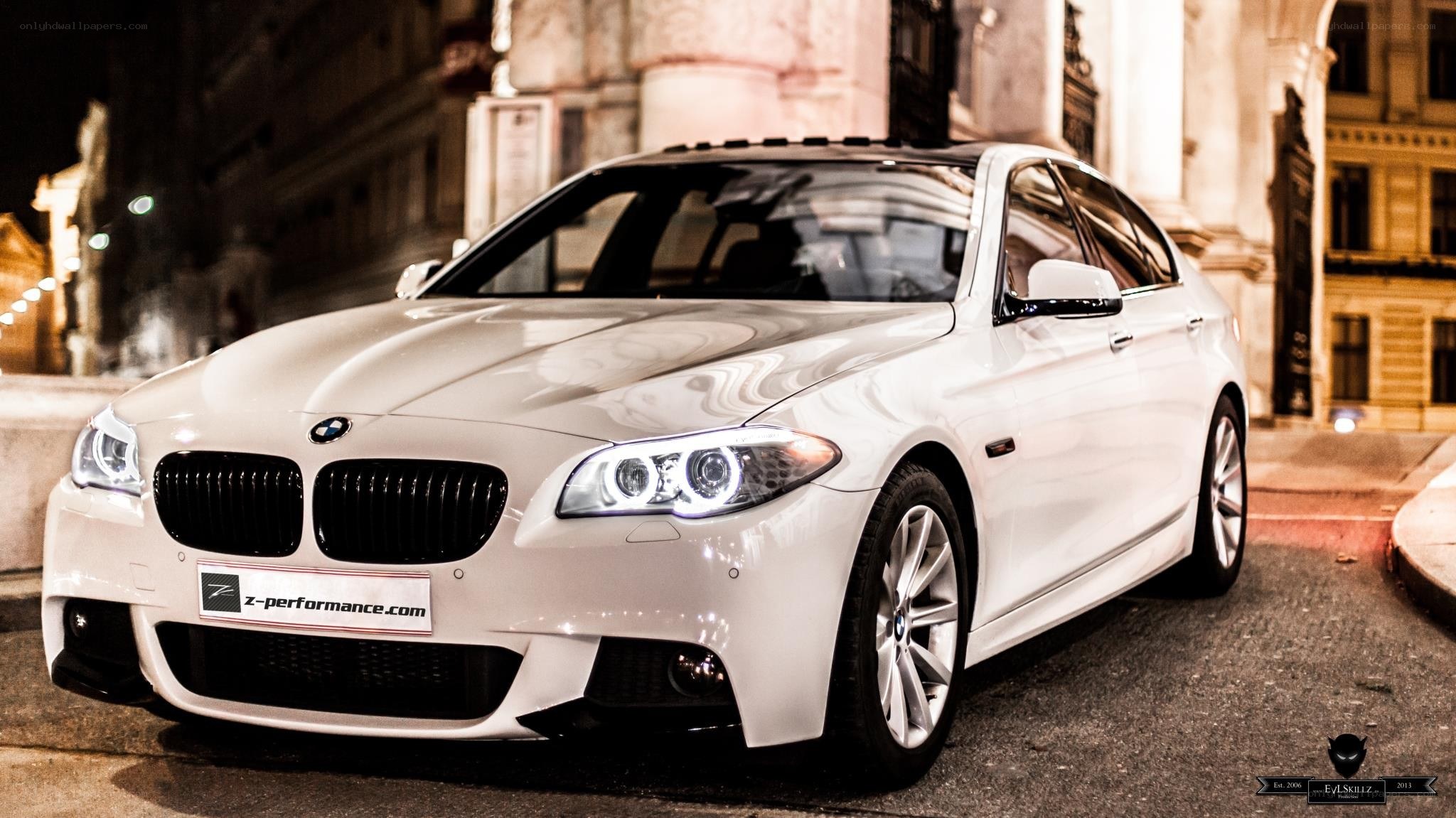 white bmw sedan at night