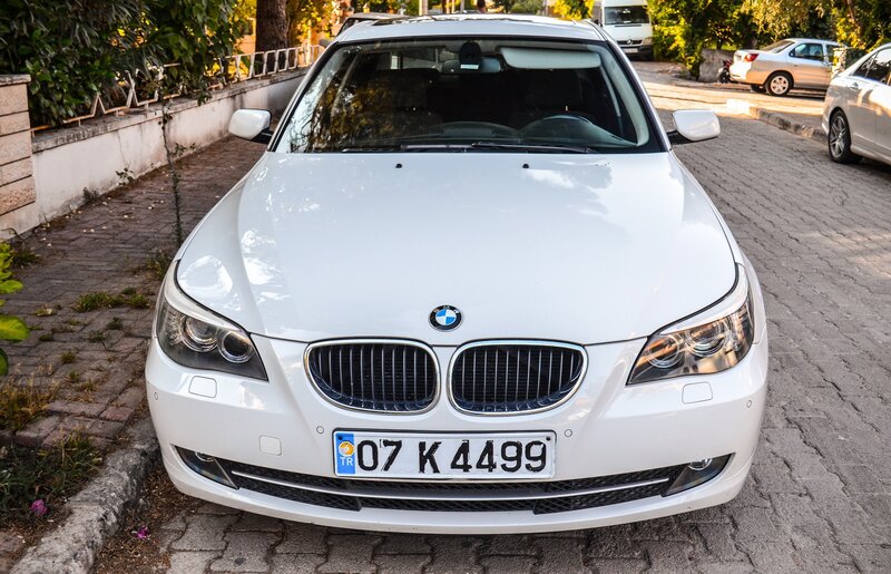 White BMW Sedan — Calm, Afternoon