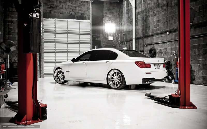 White BMW Sedan — Dramatic, Photograph, Car Lift
