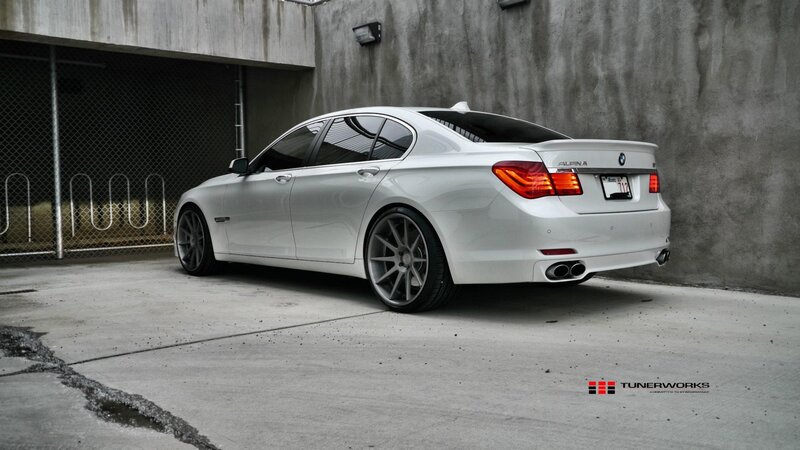 white bmw sedan in garage