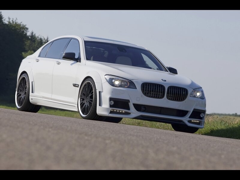 white bmw sedan on road