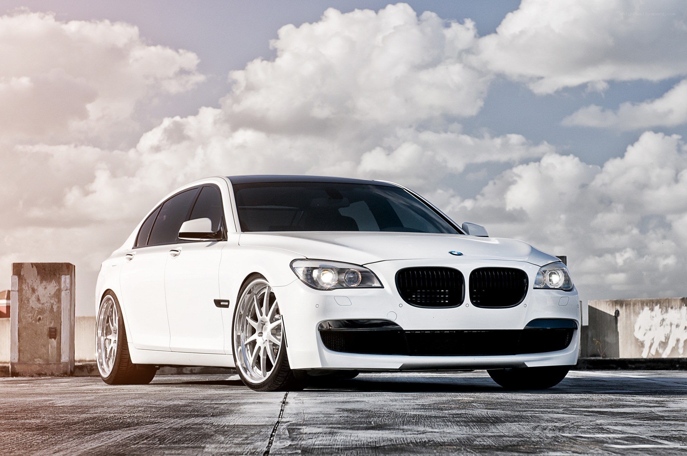 White BMW sedan on rooftop
