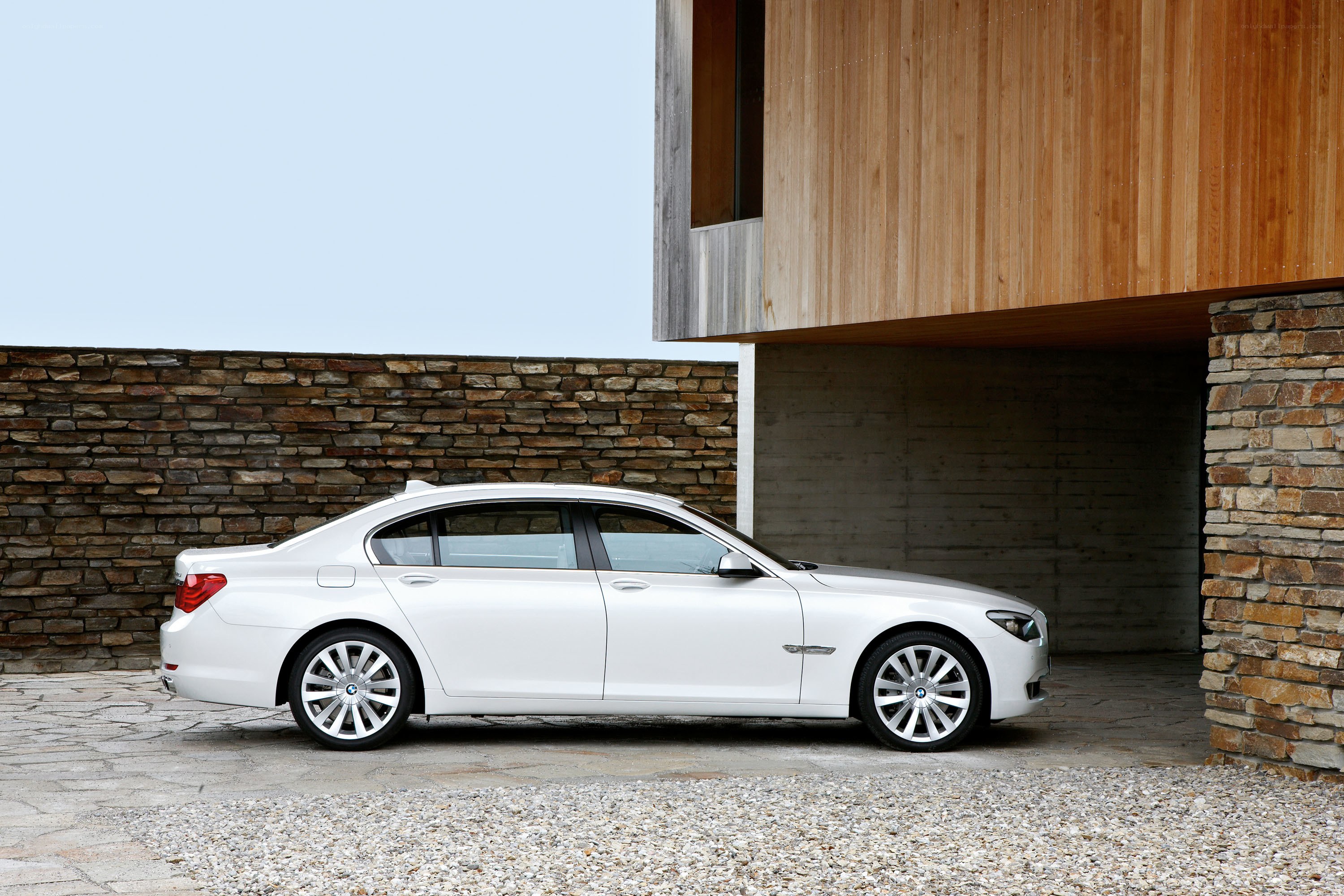 White BMW sedan parked outside