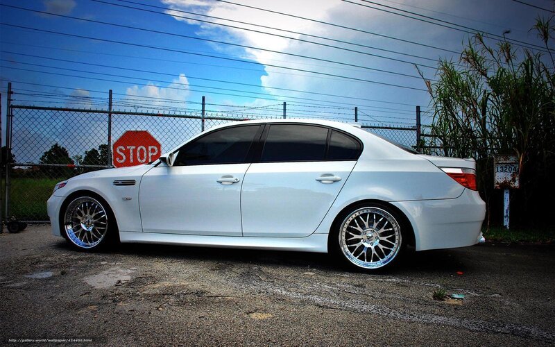 white bmw sedan parked