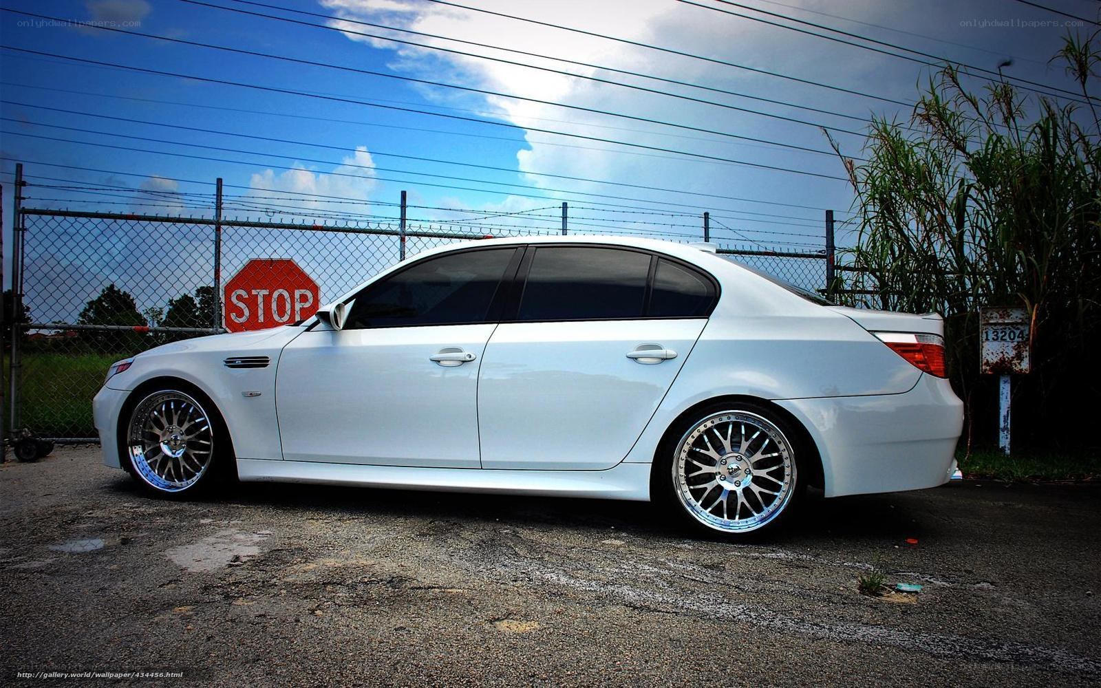white bmw sedan parked