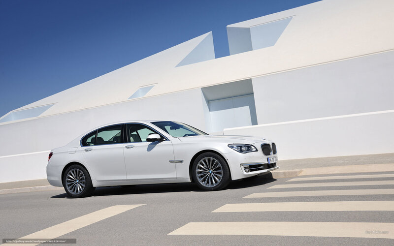 White BMW Sedan — Serene, Afternoon, Photograph, Car, Building
