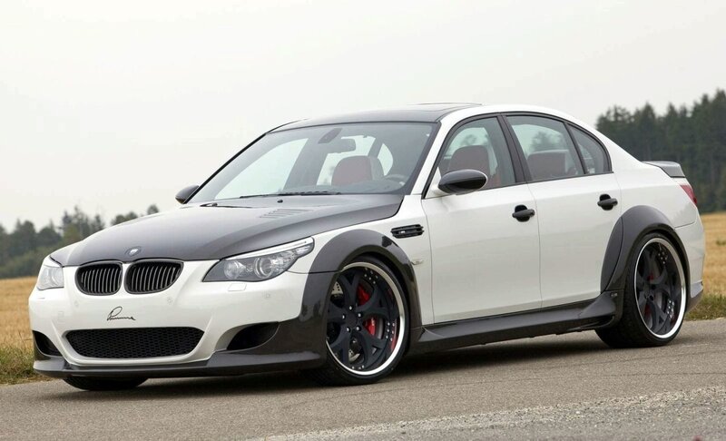 white bmw sedan with custom body kit