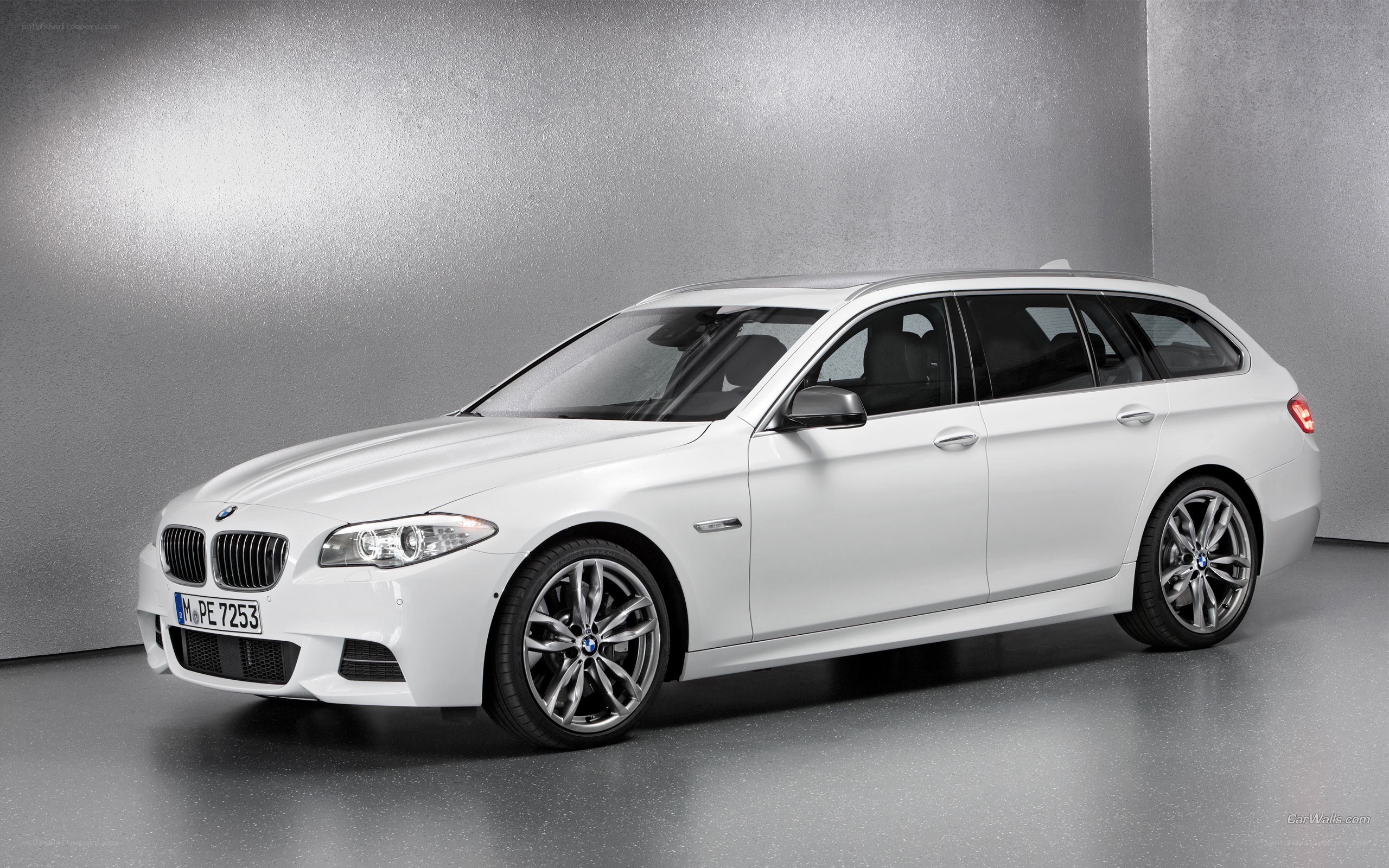 white bmw station wagon