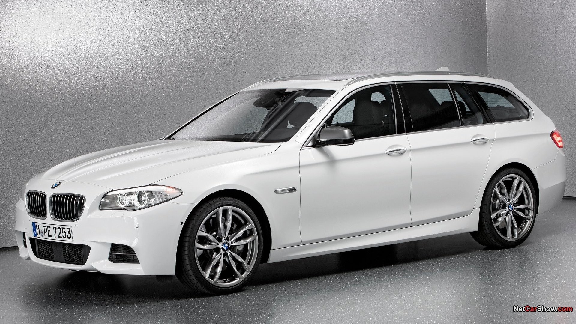 white bmw station wagon