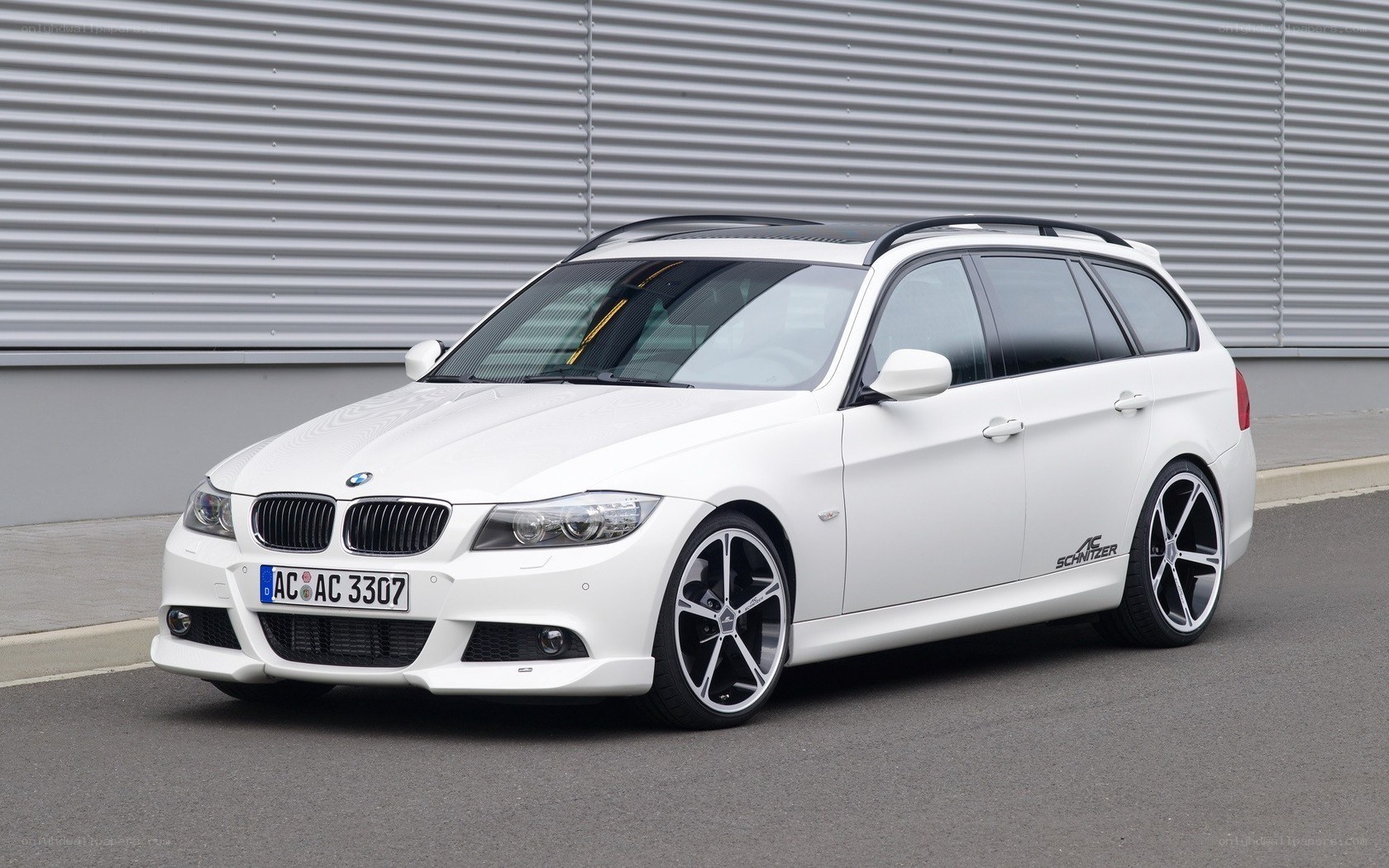 white bmw station wagon