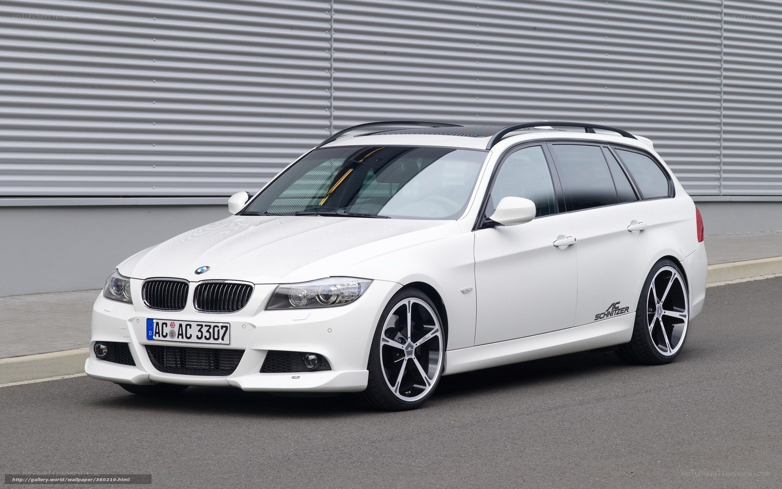 white bmw station wagon