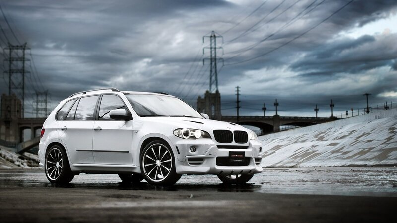White BMW SUV — Dramatic, Photograph, Bridge, Power Lines, Concrete Slope