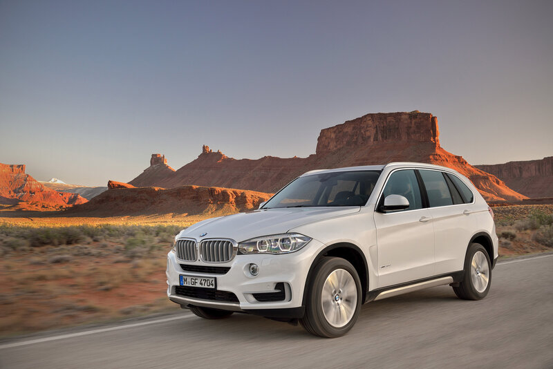 White BMW SUV — Dramatic