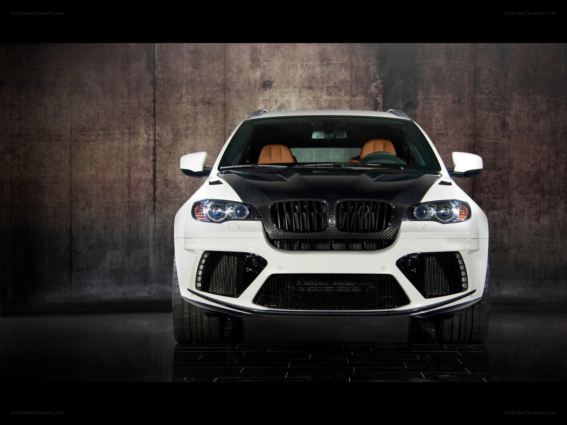 white bmw suv front view