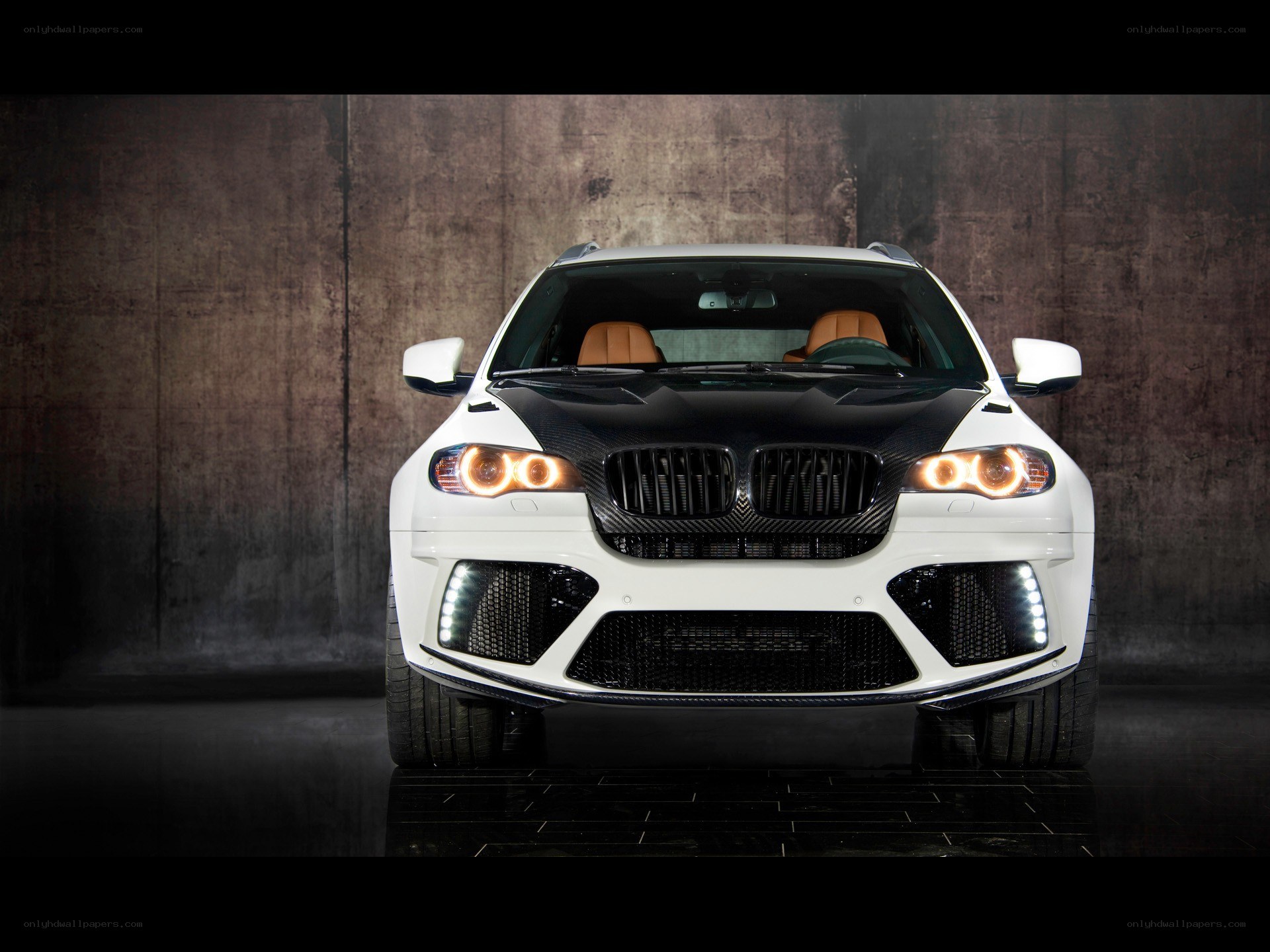 white bmw suv front view