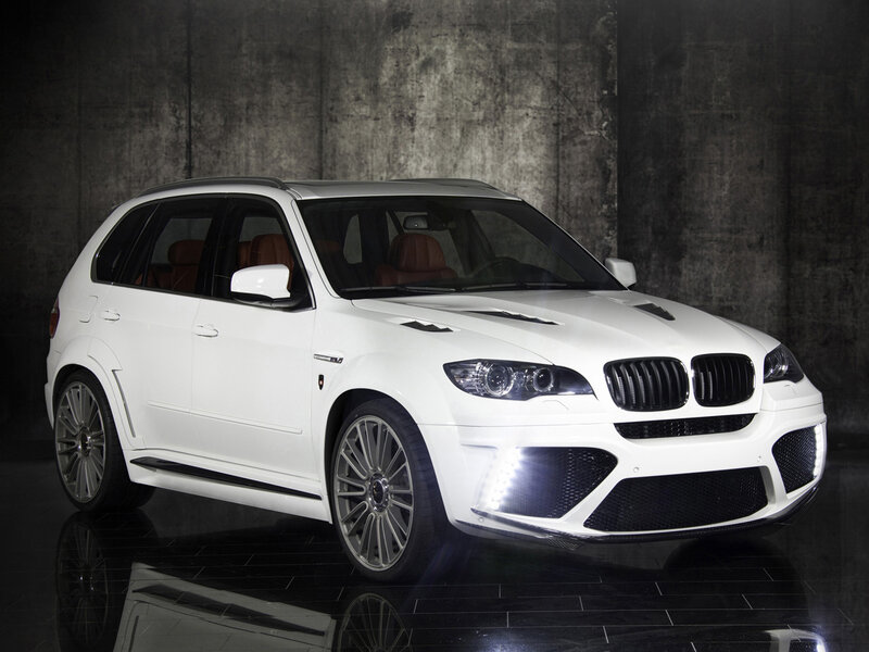 white BMW SUV in studio