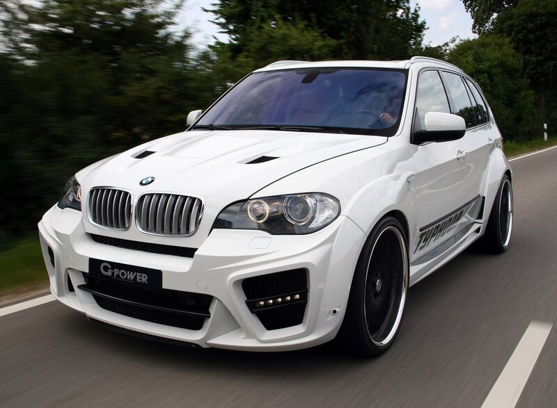 White BMW SUV on road